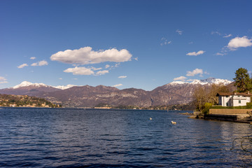 Italy, Lecco, Lake Como, a small boat in a large body of water
