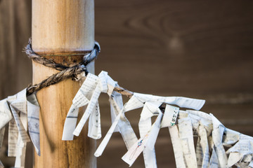 O-mikuji, Japanse random fortunes written on strips of paper at Shinto shrines and Buddhist...
