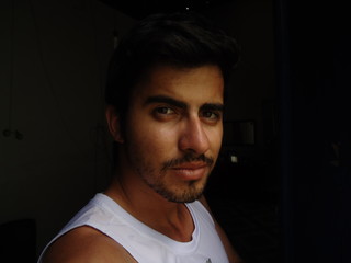 young woman of Arab descent in white sports clothes