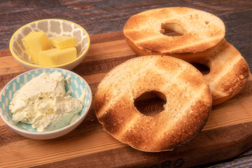 Plain toasted bagel with butter and cheese