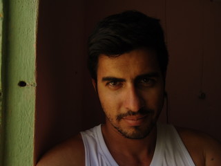 young woman of Arab descent in white sports clothes