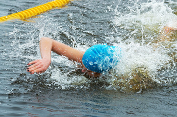 Lovers of winter swimming.Swimmer swims in the pool.