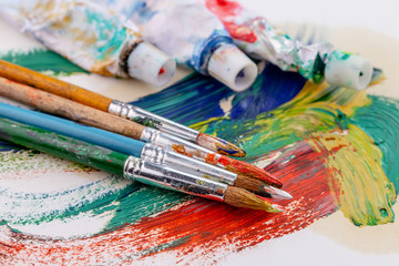 Obraz premium Paint brushes and paints for drawing.