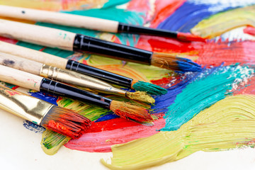 Obraz premium Paint brushes and paints for drawing.