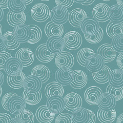 Concentric circles with dotted outline in two colors. Seamless geometric pattern on gray-blue background. Vector image