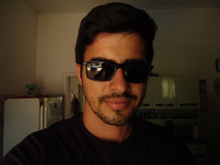 young man of arabian descent wearing sunglasses