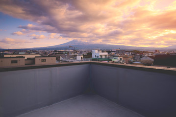 Cloud storm cover Fuji mountain from rooftop view