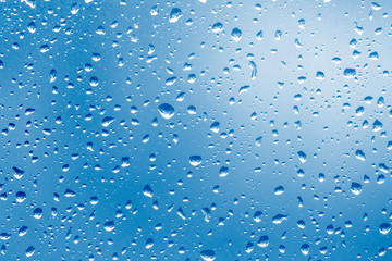 Water drops on blue background