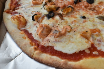 Sea pizza in a box.