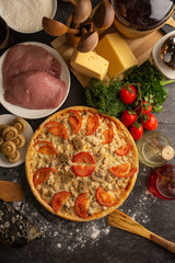 Meat pizza with pork and mushrooms