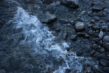 Europe, Italy, Menaggio, Lake Como, a close up of a rock next to water
