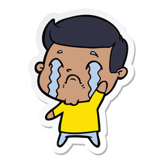sticker of a cartoon man crying
