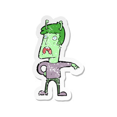 retro distressed sticker of a cartoon unhappy alien