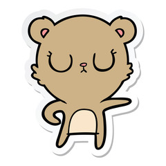 sticker of a peaceful cartoon bear