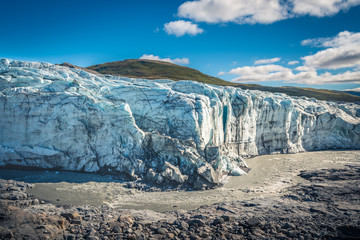 River winds underneath the Russel Glacier in the arctic Greenland, the beginning of the Arctic...