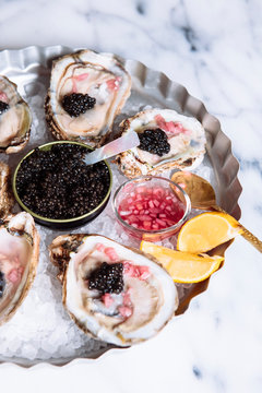 Close up of caviar on the half shell oyster