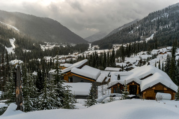 Snow covered trees and lodges in Sun Peaks Resort, Sun Peaks, Kamloops, British Columbia, Canada