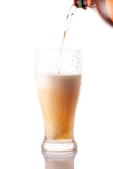 Beer is Pouring into glass