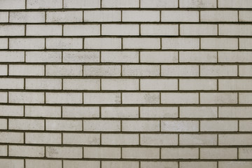 Old grey brick wall background