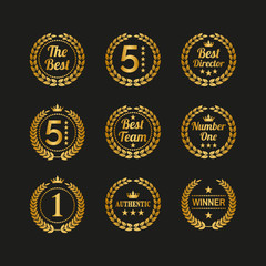 Set of golden laurel wreaths on black background.