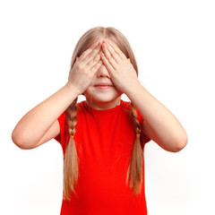 Cute little girl 5-6 years old posing and laughing in the studio on a white background