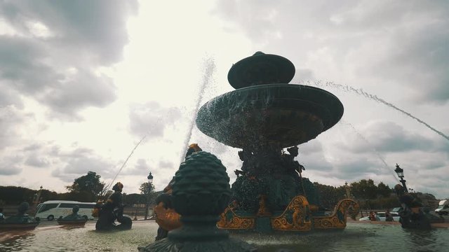 Slow motion foutain concorde grey cloud paris