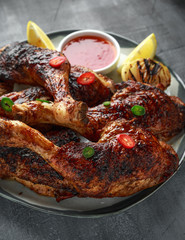 Grilled chicken legs with lemon and sweet chilli sauce