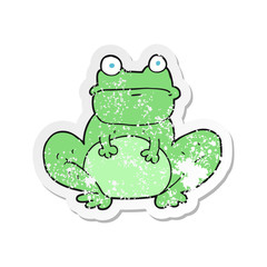 retro distressed sticker of a cartoon frog