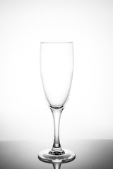 empty glasses for wine and champagne on a white background vertical