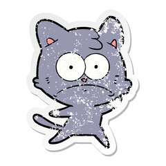 distressed sticker of a cartoon nervous cat