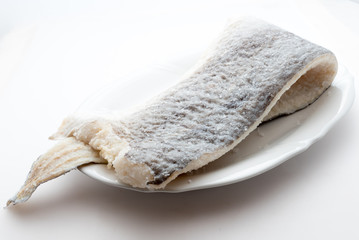 Slice of raw salted codfish