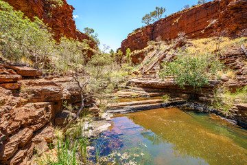 hiking down in weano gorge in karijini national park, western australia 51