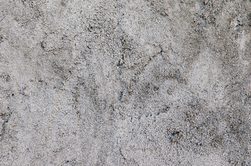 Background of gray casually superimposed concrete.