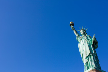 Statue of Liberty in New York with blue Sky © elfarero