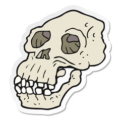sticker of a cartoon ancient skull