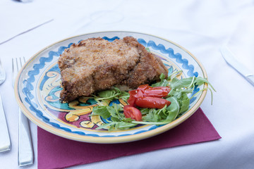 Cutlet with arugula