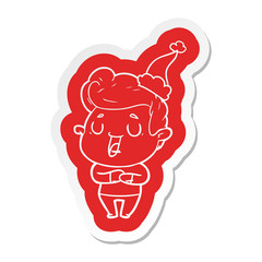 happy cartoon  sticker of a man wearing santa hat