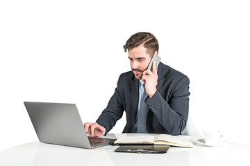 Calm businessman working with laptop, isolated
