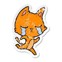 distressed sticker of a crying cartoon cat