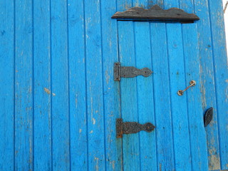 Old wooden fence with wicket door