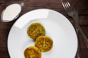 Vegetable patties on a white plate. Vegetarian food.