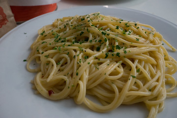 Italy, Menaggio, Lake Como, a plate of pasta and cheese