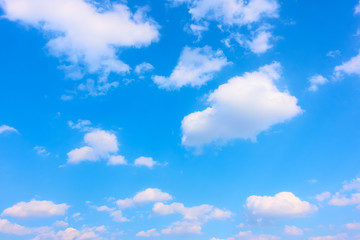 Naklejka na ściany i meble Blue sky with white heap clouds