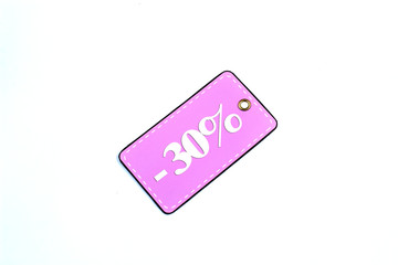 Colorful tag or label, isolated on white background. Close-up. Copy space.