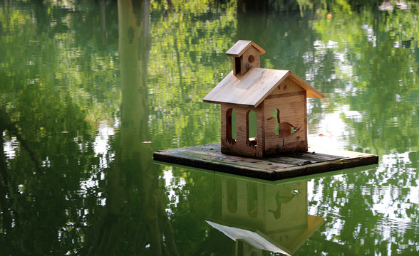 handcrafted floating wooden birdhouse for ducks