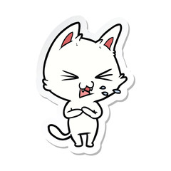 sticker of a cartoon cat hissing