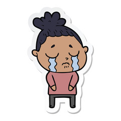 sticker of a cartoon crying woman