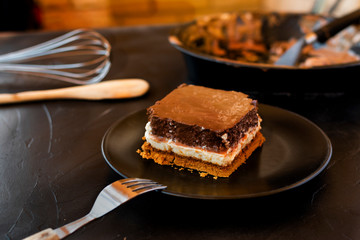 Delicious cake composed of three chocolates.