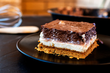 Delicious cake composed of three chocolates.