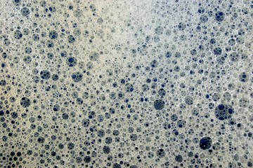Foam of soap bubbles. Foam is characterized by a cellular film structure in which the gas — filled cells are separated by thin films-the walls of the bubbles. Foam bubbles are unstable disperse system